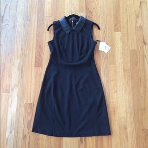 Knee-length suit dress with leather collar